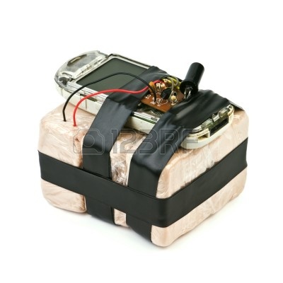 8483593-homemade-bomb-with-mobile-phone-isolated.jpg
