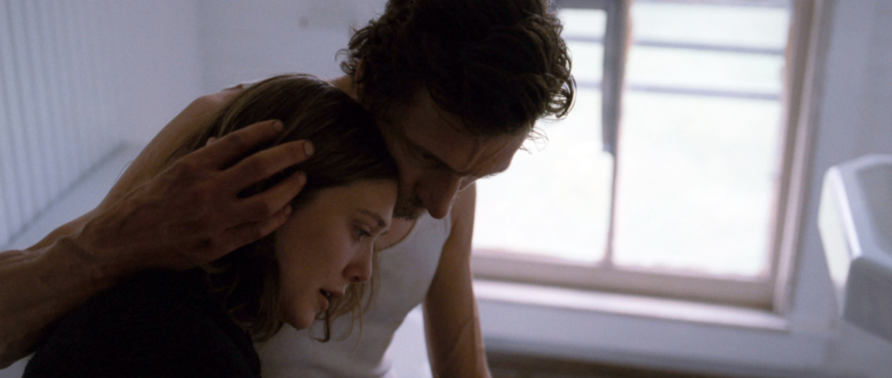 MARTHA MARCY MAY MARLENE, from left: Elizabeth Olsen, John Hawkes, 2011. TM and Copyright ©20th Century Fox Film Corp. All rights reserved./Courtesy Everett Collection