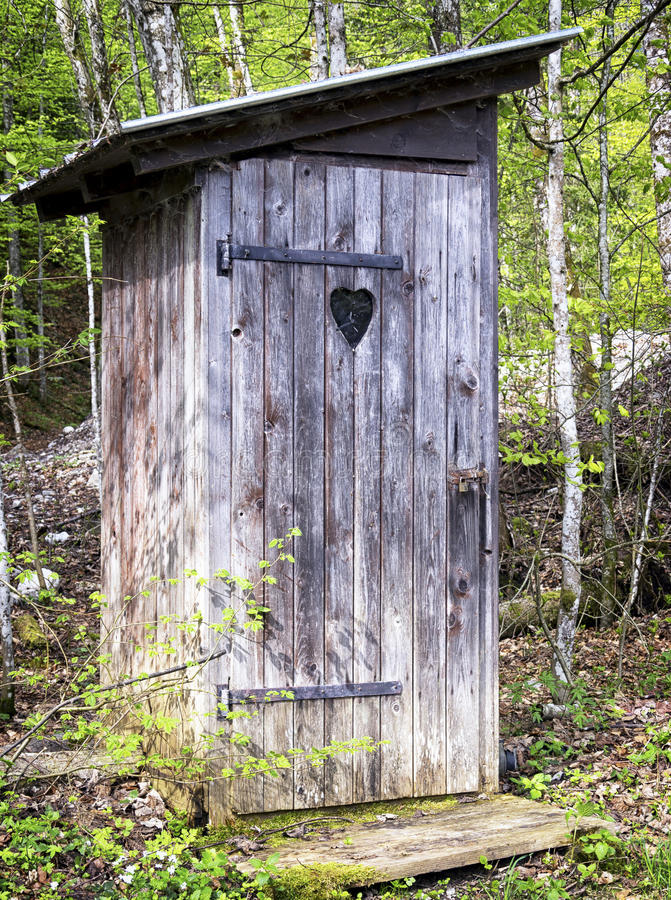 old-wooden-outhouse-forest-36137171.jpg