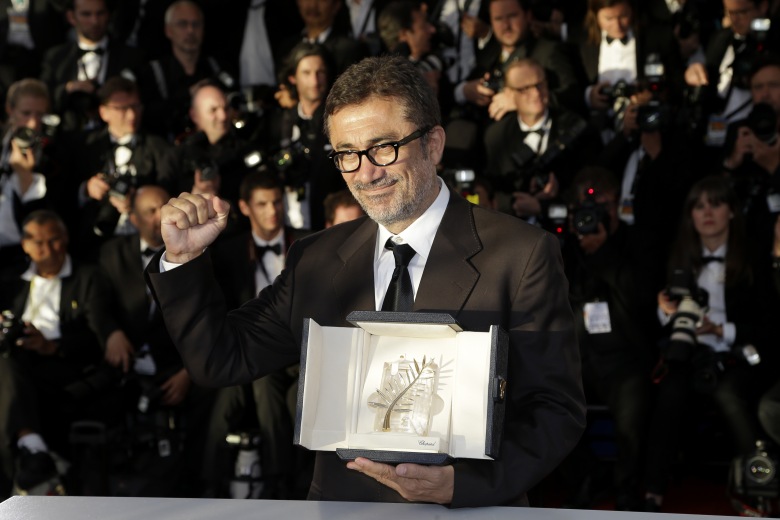 Director Nuri Bilge Ceylan poses with the Palme d'Or award for the film Winter Sleep during a photo call following the awards ceremony at the 67th international film festival, Cannes, southern FranceFrance Cannes Awards Photo Call, Cannes, France
