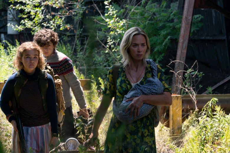 L-r, Regan (Millicent Simmonds), Marcus (Noah Jupe) and Evelyn (Emily Blunt) brave the unknown in A Quiet Place Part II.”