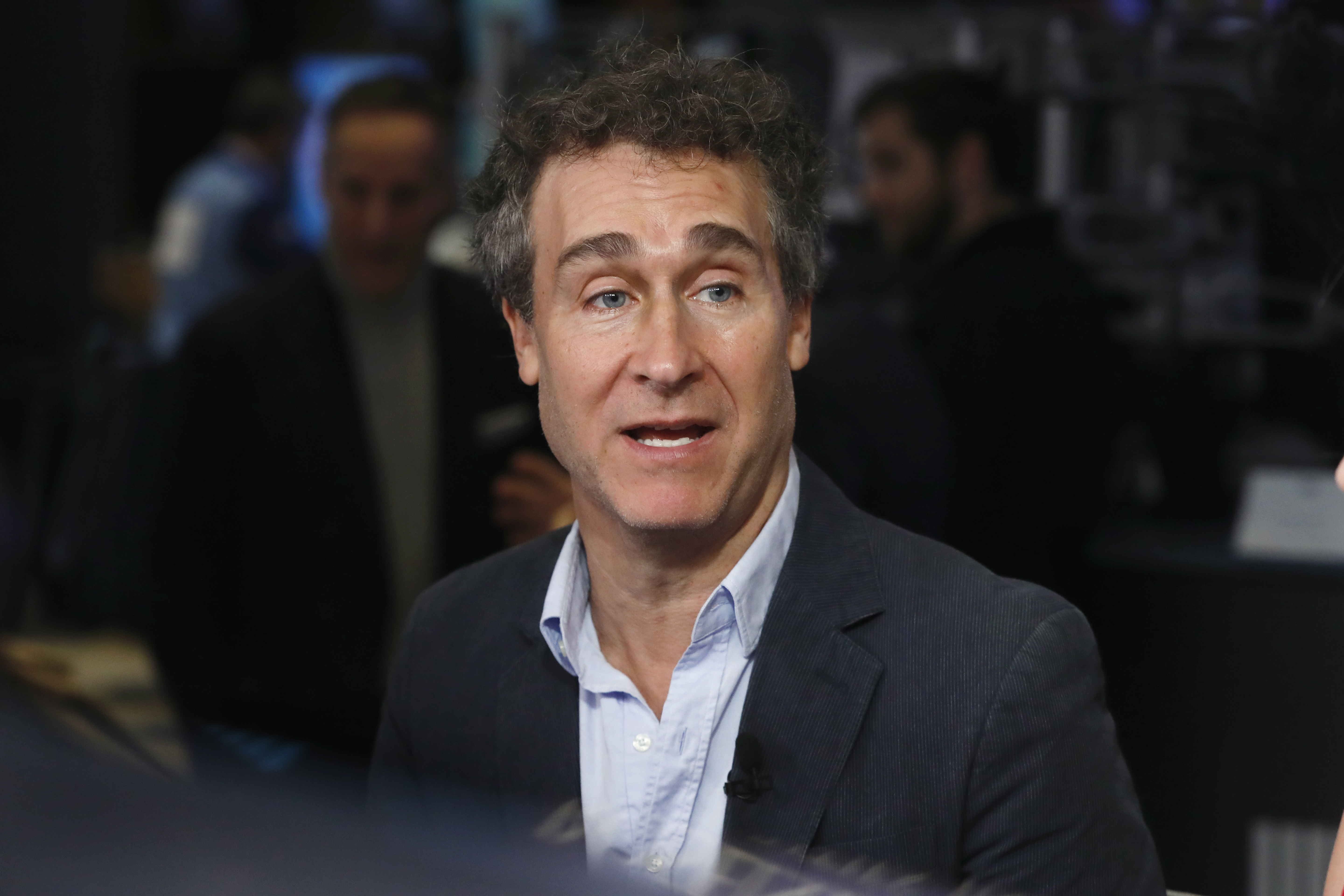 FILE - Film director Doug Liman appears on the floor of the New York Stock Exchange, on Oct. 22, 2018. In four months, in the middle of a pandemic and widespread shutdowns, Liman and his team wrote, shot and edited a glossy Harrods heist film in London with Anne Hathaway and Chiwetel Ejiofor. The result, “Locked Down,” comes to HBO Max Thursday. (AP Photo/Richard Drew, File)