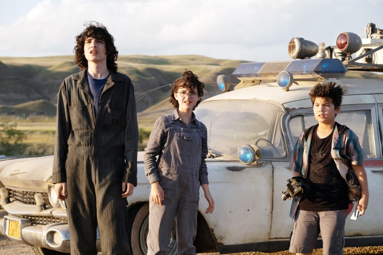 GHOSTBUSTERS: AFTERLIFE, from left: Finn Wolfhard, Mckenna Grace, Logan Kim, 2021. ph: Kimberley French / © Columbia Pictures / courtesy Everett Collection