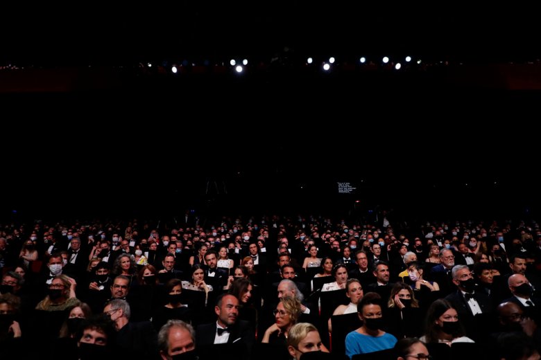 members of the audience are seen at the opening ceremony of the 74th international film festival, Cannes, southern France, Tuesday, July 6, 2021. (Photo by Vianney Le Caer/Invision/AP)