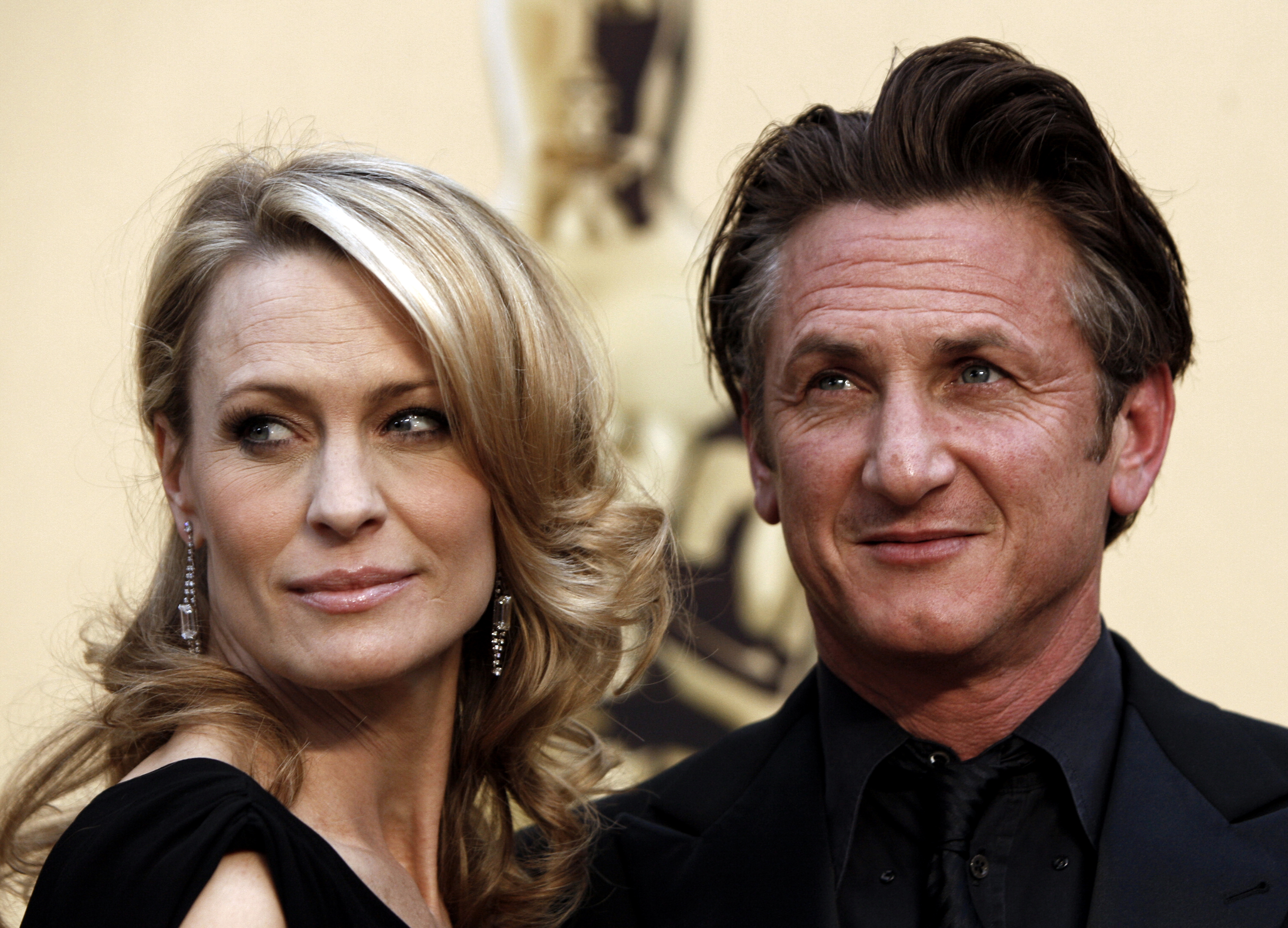 FILE - In this Feb. 22, 2009 file photo, Robin Wright Penn, left, and Sean Penn arrive for the 81st Academy Awards in the Hollywood section of Los Angeles. (AP Photo/Matt Sayles, file)