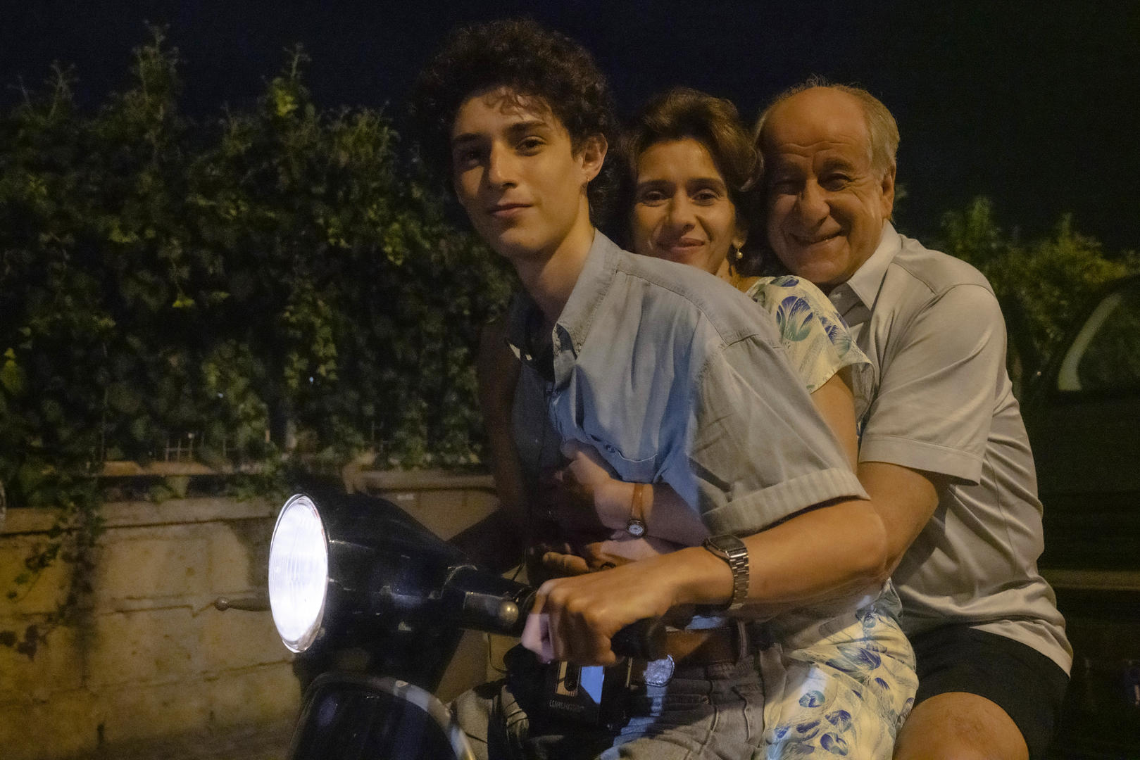 Set of The hand of God by Paolo Sorrentino.in the picture Filippo Scotti, Toni Servillo and Teresa Saponangelo.Photo by Gianni FioritoThis photograph is for editorial use only, the copyright is of the film company and the photographer assigned by the film production company and can only be reproduced by publications in conjunction with the promotion of the film.The mention of the author-photographer is mandatory: Gianni Fiorito.Set del film E' stata la mano di Dio di Paolo Sorrentino.Nella foto Filippo Scotti, Toni Servillo e Teresa Saponangelo.Foto di Gianni FioritoQuesta fotografia è solo per uso editoriale, il diritto d'autore è della società cinematografica e del fotografo assegnato dalla società di produzione del film e può essere riprodotto solo da pubblicazioni in concomitanza con la promozione del film. E’ obbligatoria la menzione dell’autore- fotografo: Gianni Fiorito.