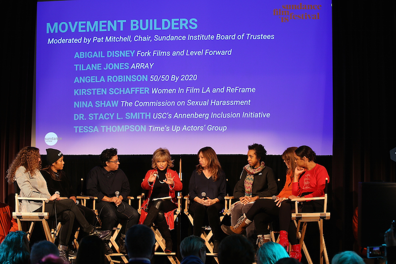 PARK CITY, UT - JANUARY 22: (L-R) Abigal Disney, Tilane Jones, Angela Robinson, Pat Mitchell, Kirsten Schaffer, Nina Shaw, Dr. Stacy L. Smith, and Tessa Tompson speak onstage at The Sundance Institute, Refinery29, and DOVE Chocolate Present 2018 Women at Sundance Brunch at The Shop on January 22, 2018 in Park City, Utah. (Photo by Phillip Faraone/Getty Images for Refinery29)