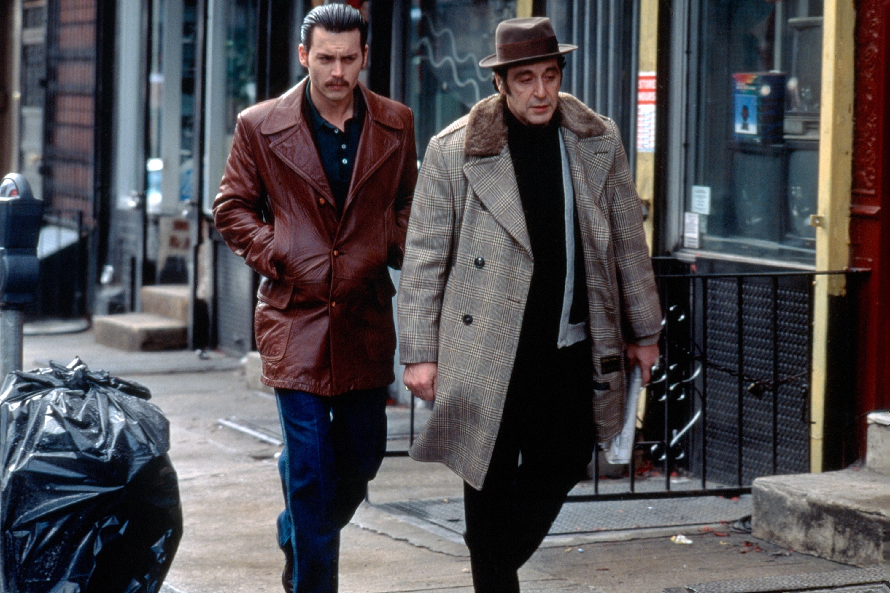 DONNIE BRASCO, from left: Johnny Depp, Al Pacino, 1997. © Sony Pictures/Courtesy Everett Collection