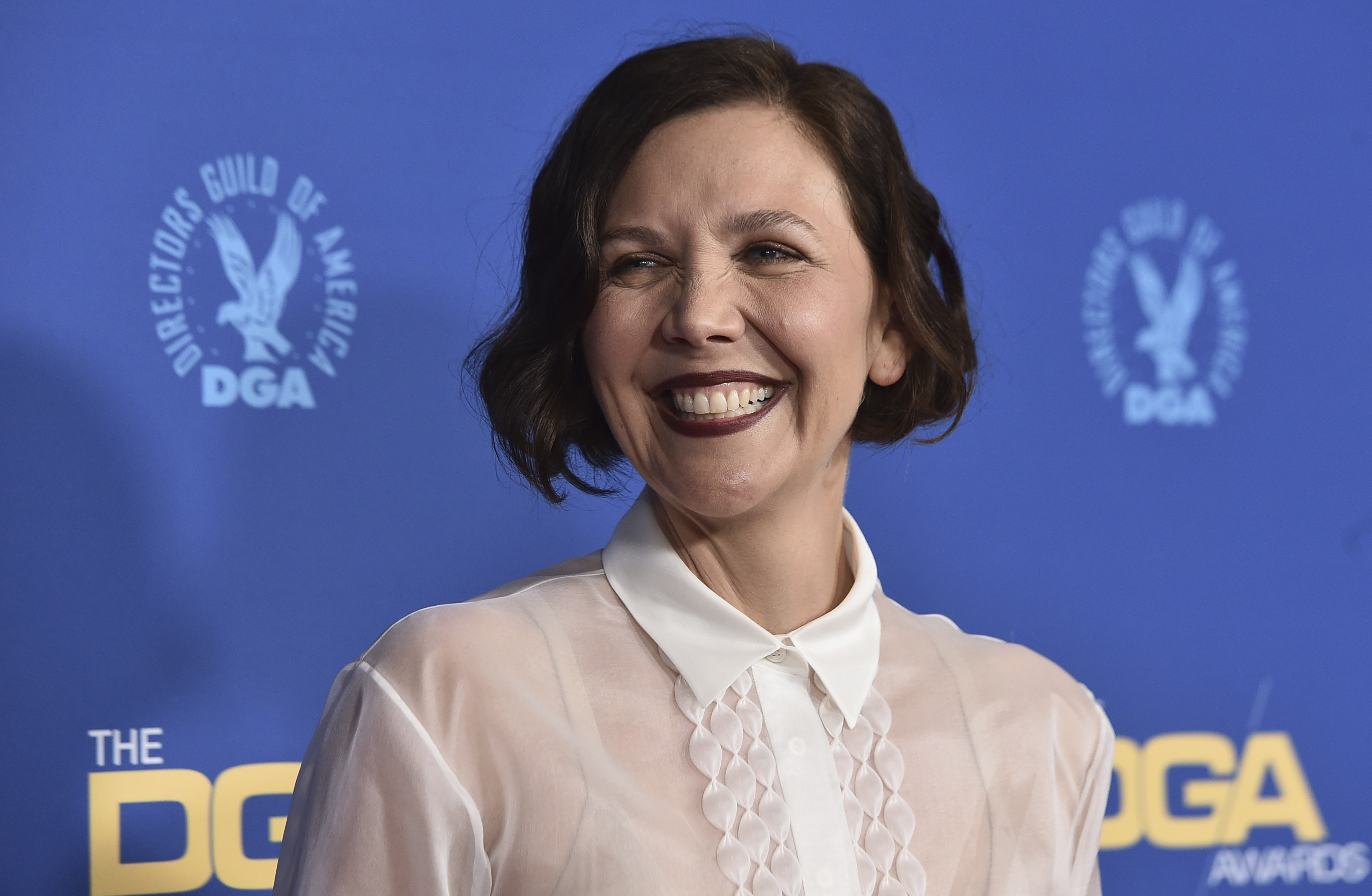 Maggie Gyllenhaal arrives at the 74th annual Directors Guild of America Awards, Saturday, March 12, 2022, at The Beverly Hilton in Beverly Hills, Calif. (Photo by Jordan Strauss/Invision/AP)