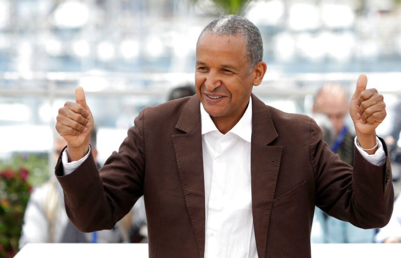 Director Abderrahmane Sissako during a photo call for Timbuktu at the 67th international film festival, Cannes, southern France, Thursday, May 15, 2014. (AP Photo/Thibault Camus)