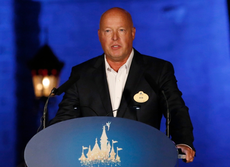FILE - Disney chief executive Bob Chapek speaks during a ceremony at Hong Kong Disneyland on Sept. 11, 2015. In a virtual presentation for investors, Chapek laid out direct-to-consumer efforts, leaning heavily on some of the company's biggest brands. But even as Disney emphasized its expanding streaming portfolio, the company said it remains dedicated to releasing many of its big-budget spectacles in movie theaters. (AP Photo/Kin Cheung, File)
