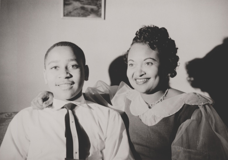 Emmett Till with his mother, Mamie Bradley, ca. 1950. To expose the horror of her 14 year-old's lynching, she ordered an open coffin funeral to show his tortured and mutilated body. - (BSLOC_2015_1_103)