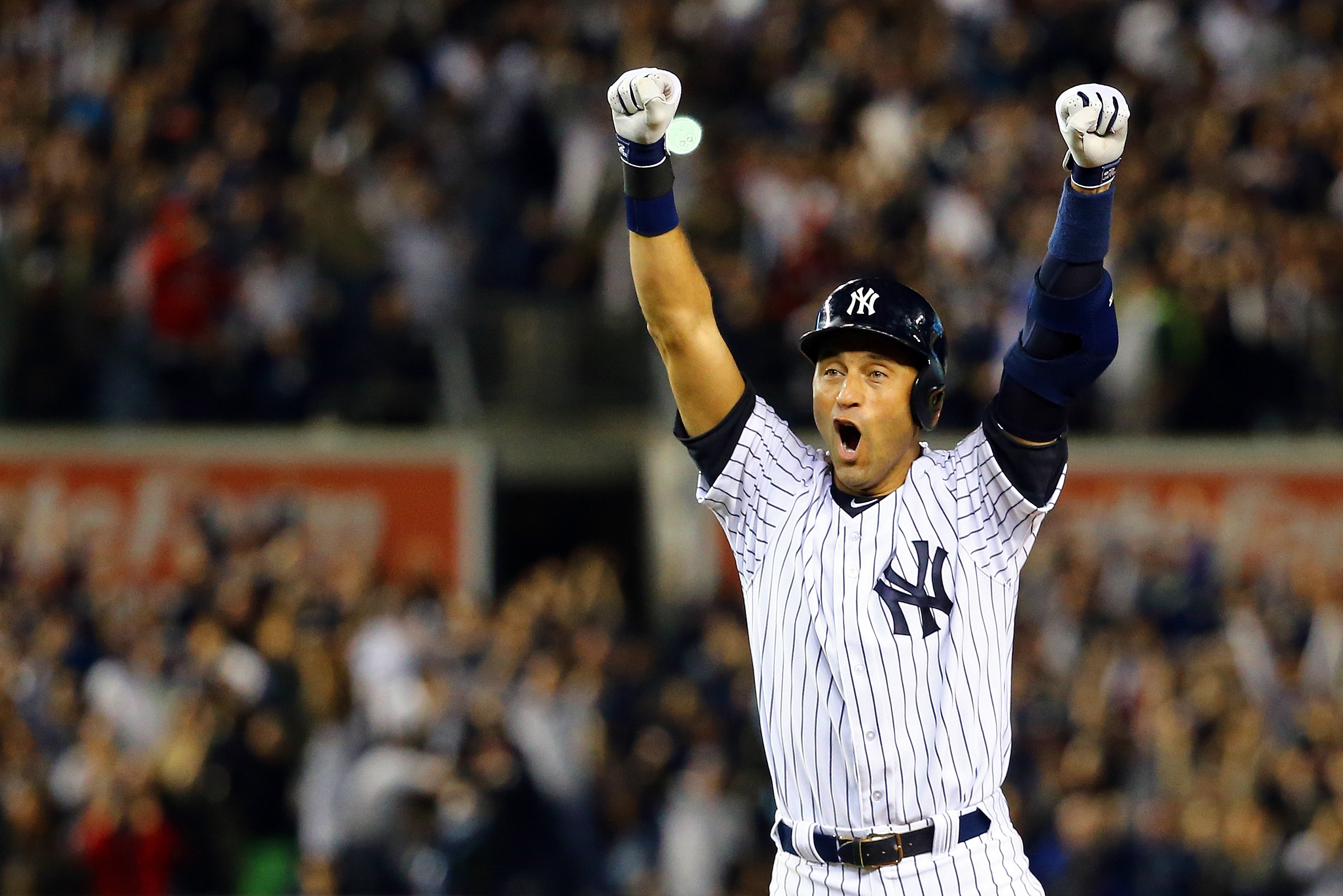 NEW YORK, NY - SEPTEMBER 25: Derek Jeter #2 of the New York Yankees celebrates after a game winning RBI hit in the ninth inning against the Baltimore Orioles in his last game ever at Yankee Stadium on September 25, 2014 in the Bronx borough of New York City. (Photo by Al Bello/Getty Images)