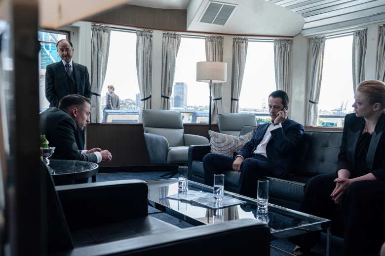 Roman, Shiv, and Kendall Roy in a private room on a yacht in Episode 3 of Season 4 of Succession 
