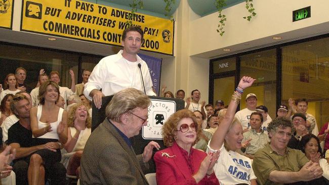 LOS ANGELES, UNITED STATES:  US actor Billy Baldwin (C) speaks in support of the seven-week actors' unions (Screen Actors Guild/American Federation of Television and Radio Artists) strike against the advertising industry as other actors listen at SAG/AFTRA headquarters in Los Angeles, 13 June 2000. The unions are striking against the commercial companies' decision to pay them a flat rate and end residual payments which they receive every time a commercial is aired.    (ELECTRONIC IMAGE)   AFP PHOTO/Lucy NICHOLSON (Photo credit should read LUCY NICHOLSON/AFP via Getty Images)